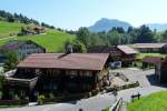 Gunzesried (Ortsteil von Blaichach / Oberallgäu / August 2011) mit dem Grünten im Hintergrund