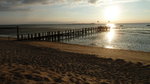 Sonnenuntergang über dem Hörnumtief. Im Hintergrund links die Nordseeinsel Amrum. Blick über die Wattfläche vor Utersum, einem Inseldorf auf Föhr. (Webcam: http://www.foehr.de/utersumer-strand-mit-blick-nach-amrum). Foto: Spätsommer 2014